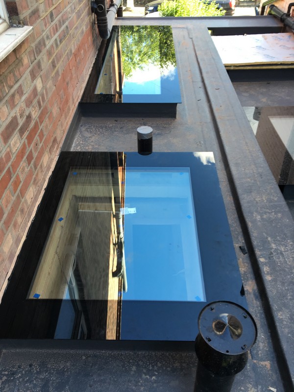 Multiple flat roof skylights on extension in Forest Gate